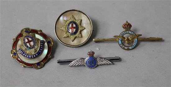 A second World war POW wood covered box and four military badges